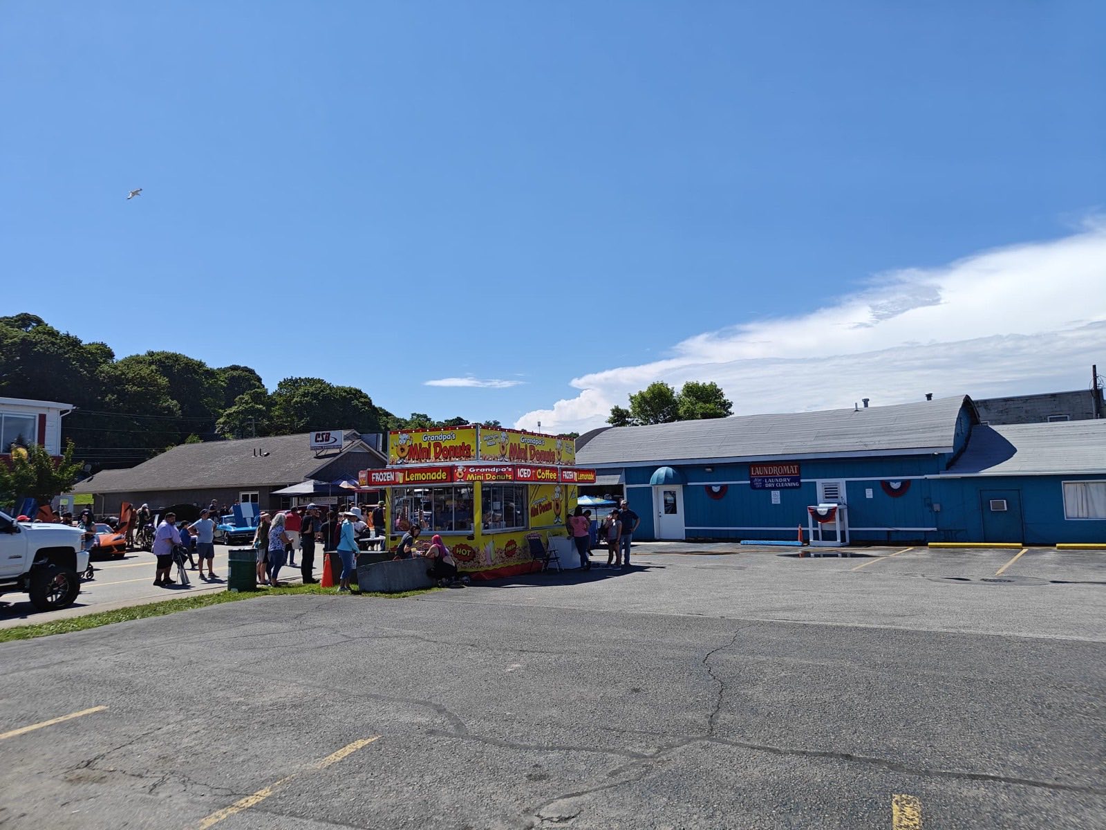 The parking lot at Bayside Coin Laundry, 417 N State St, St. Ignace — a two-minute walk from the Mackinac Island ferry docks